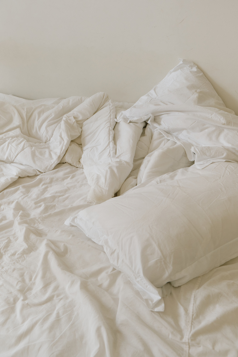 White Pillow and Blanket on the Bed